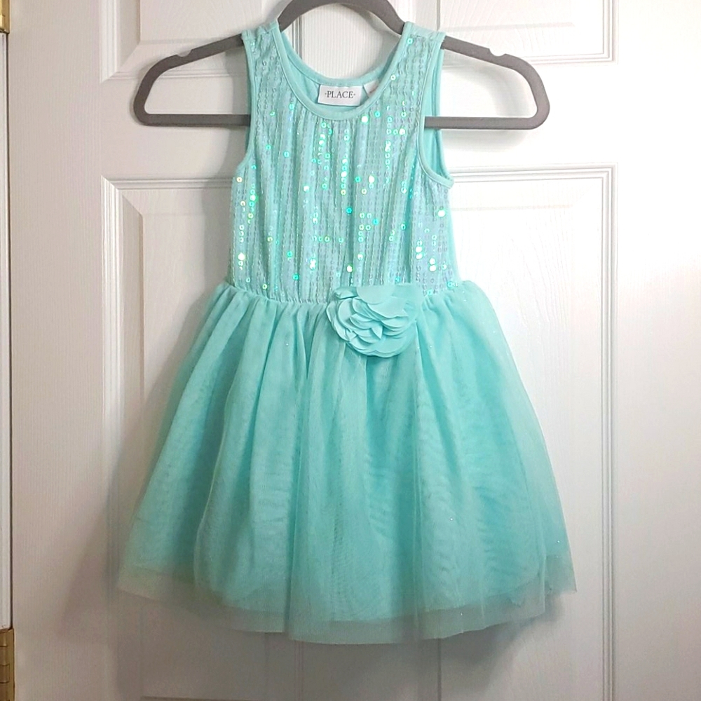 Seafoam green Sequin dress with tulle bottom.